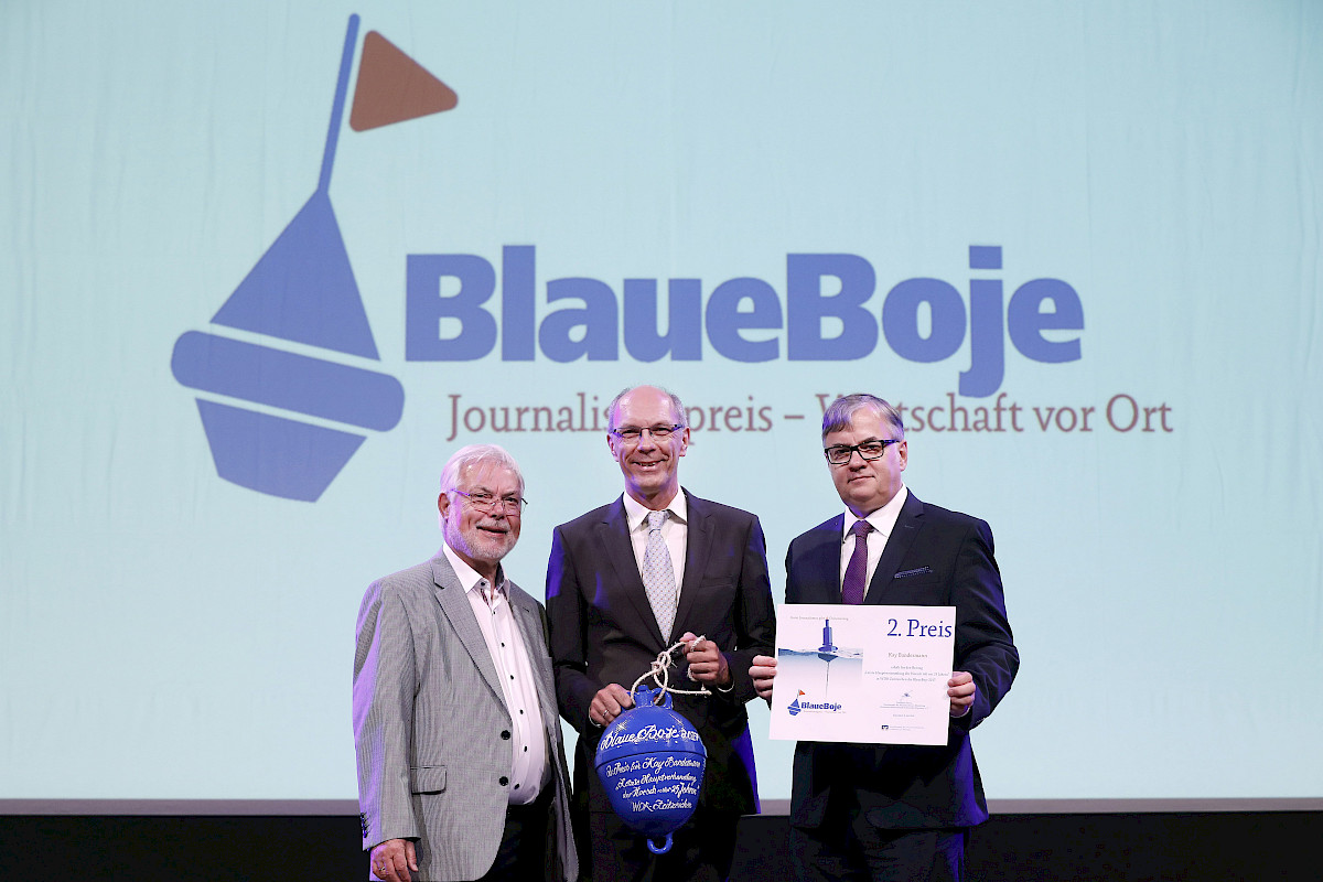 blaueboje_kay_bandermann_christoph_kaminsi_vr-bank_rhein-erft.jpg