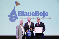 blaueboje_kay_bandermann_christoph_kaminsi_vr-bank_rhein-erft.jpg